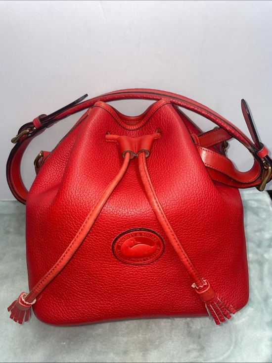 Dooney & Bourke Handbags - Vintage Dooney &  Bourke All Weather Leather Drawstring Bucket Bag
